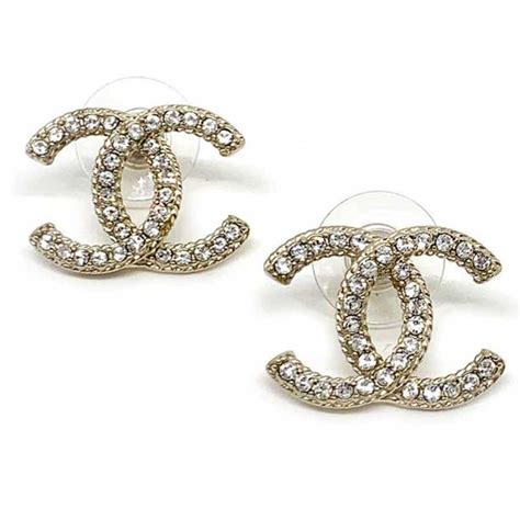 boucle d oreille chanel métal et strass|Boucles d'oreilles pendantes .